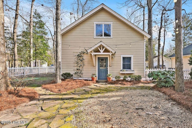 view of front of house featuring fence