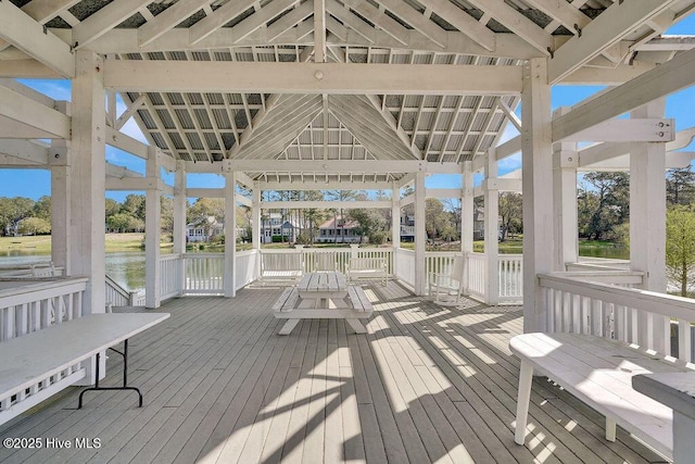 unfurnished sunroom featuring lofted ceiling