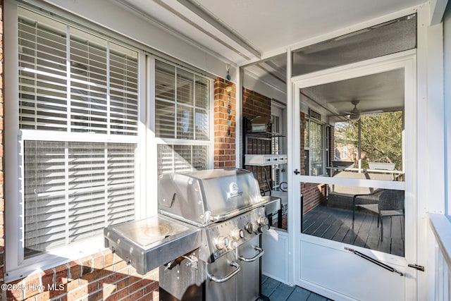 wooden terrace featuring grilling area