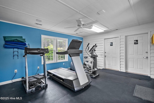 workout room featuring visible vents, baseboards, and a ceiling fan