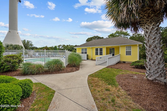 exterior space with a fenced in pool, crawl space, covered porch, and fence