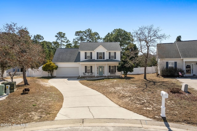 view of front of house featuring concrete driveway, covered porch, fence, and an attached garage