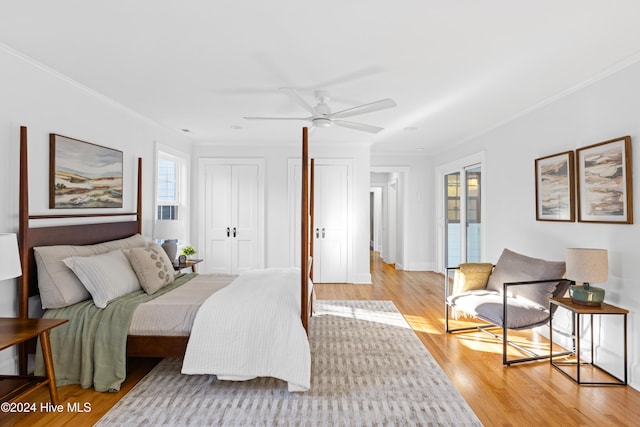 bedroom featuring crown molding, ceiling fan, and light wood-style floors