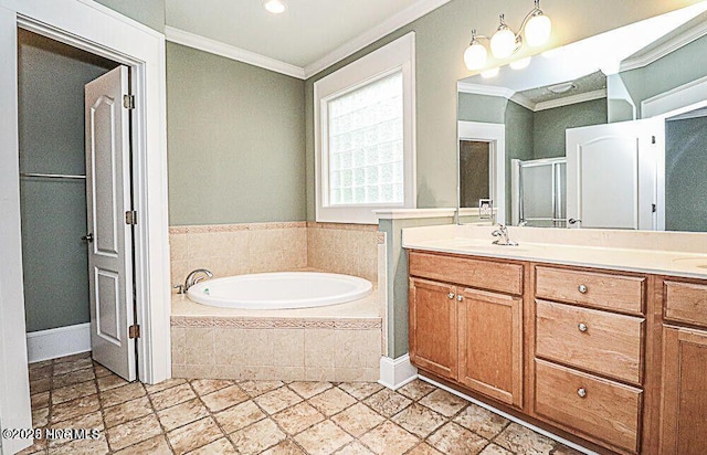 full bath with a sink, a shower stall, a bath, double vanity, and crown molding