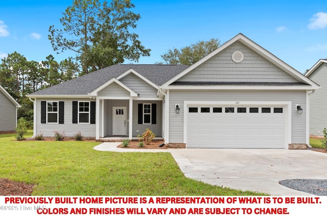 single story home with a front lawn, concrete driveway, and an attached garage