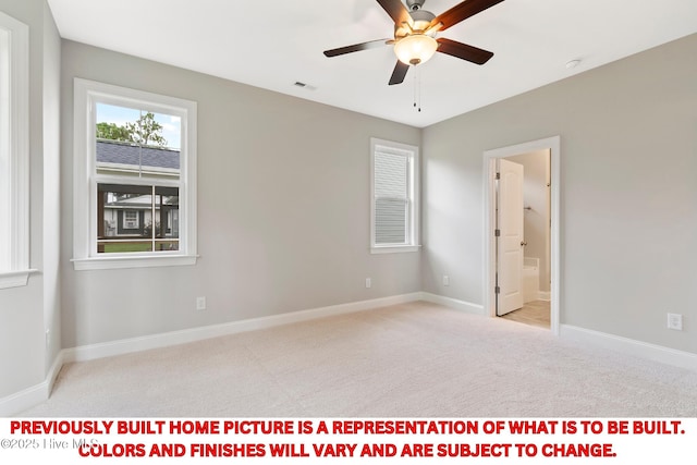 spare room with visible vents, baseboards, carpet floors, and ceiling fan