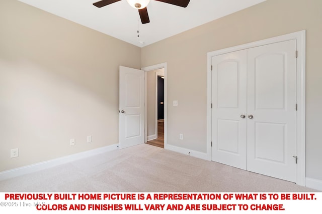 unfurnished bedroom with a ceiling fan, carpet, a closet, and baseboards