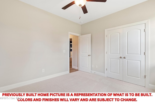 unfurnished bedroom with a closet, baseboards, carpet, and a ceiling fan