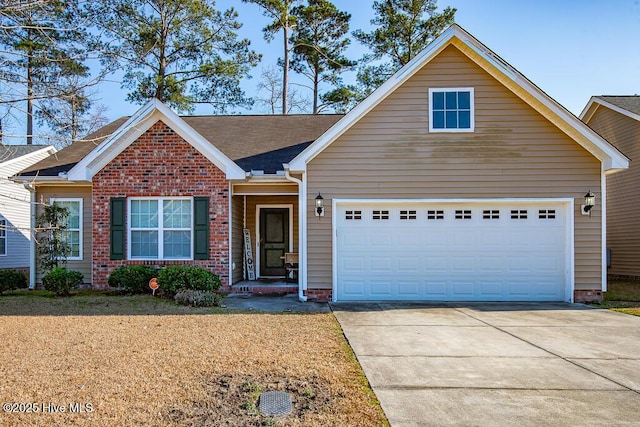 view of front of property with a garage, concrete driveway, brick siding, and a shingled roof