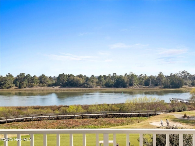 property view of water featuring fence