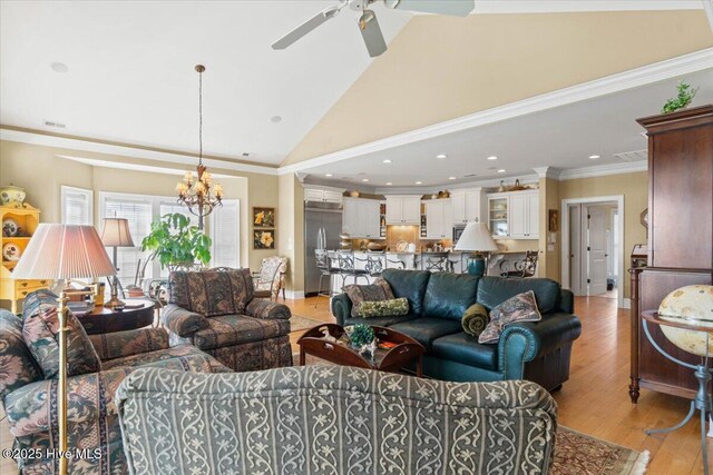 living room featuring recessed lighting, crown molding, light wood-style flooring, high vaulted ceiling, and ceiling fan with notable chandelier