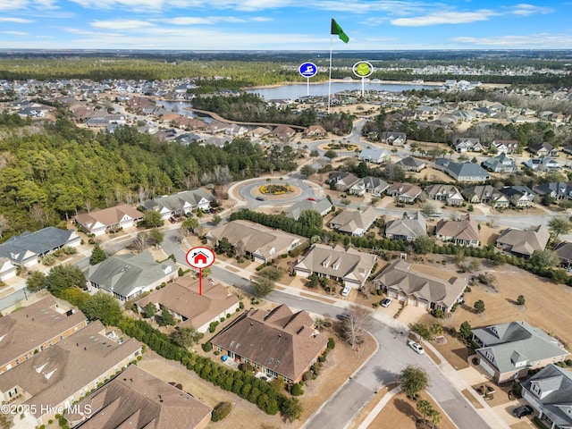 aerial view featuring a water view and a residential view