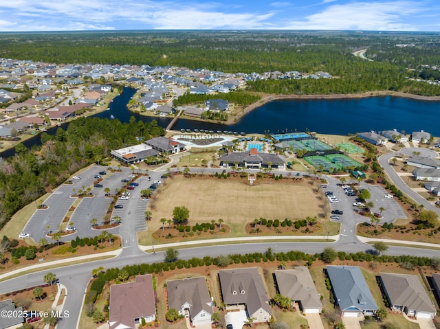 bird's eye view featuring a residential view and a water view