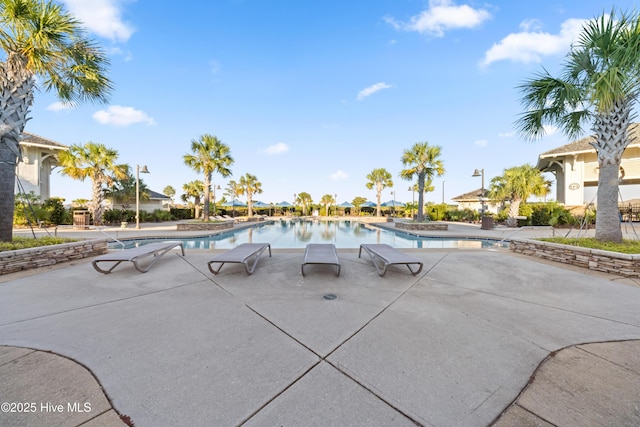 pool featuring a patio area