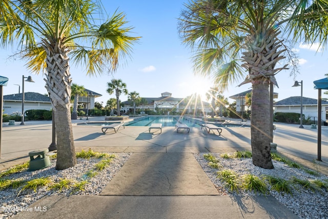 community pool with a patio