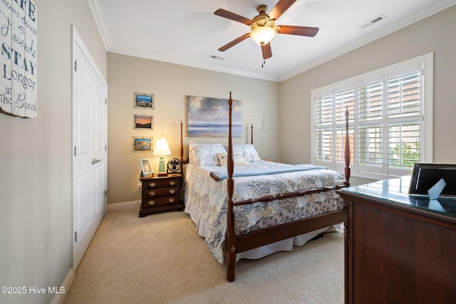 bedroom featuring visible vents, light colored carpet, crown molding, and baseboards