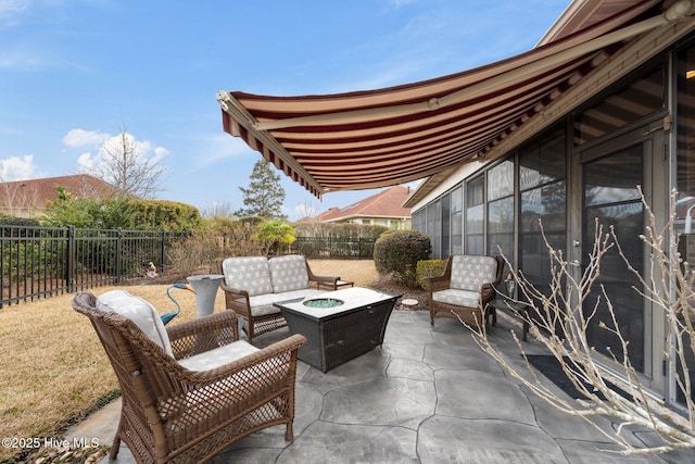 view of patio with a fire pit and a fenced backyard