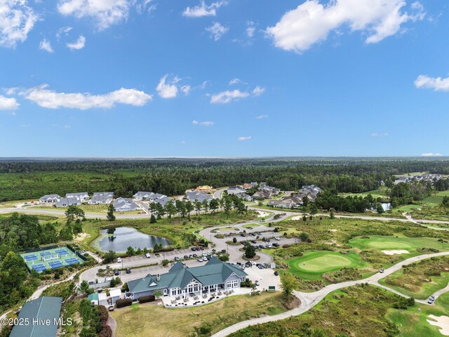 drone / aerial view with a view of trees