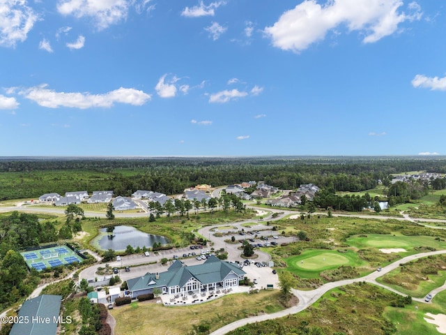 aerial view with a water view and golf course view