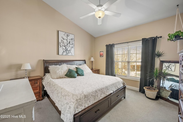 bedroom with lofted ceiling, baseboards, a ceiling fan, and light colored carpet