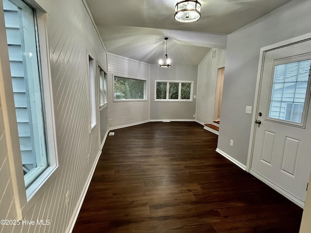 interior space with lofted ceiling and a wealth of natural light