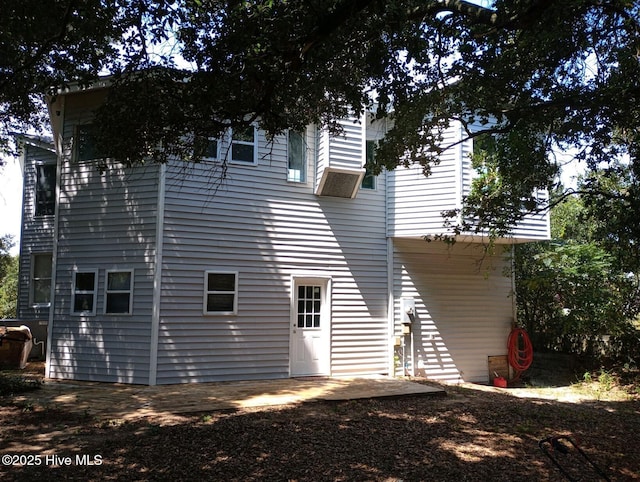 rear view of house with a patio area