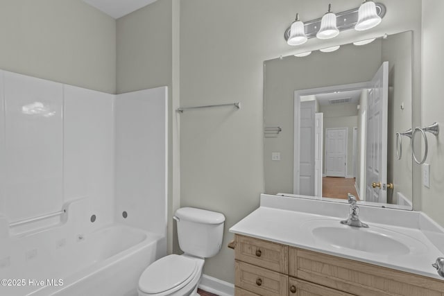 bathroom with visible vents, toilet, tub / shower combination, vanity, and baseboards