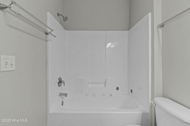 full bathroom with toilet and shower / washtub combination