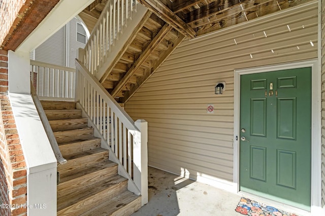 entrance to property with brick siding