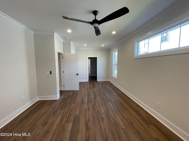 interior space featuring baseboards, a ceiling fan, dark wood-type flooring, crown molding, and recessed lighting