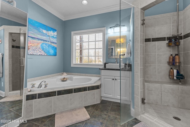 full bathroom with a stall shower, a garden tub, tile patterned flooring, crown molding, and vanity