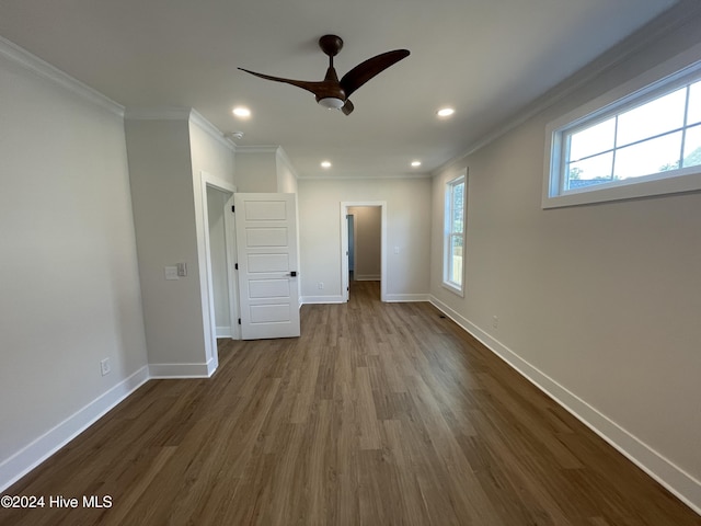 unfurnished bedroom with ornamental molding, recessed lighting, dark wood finished floors, and baseboards