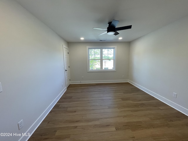 unfurnished room with ceiling fan, dark wood-style flooring, recessed lighting, and baseboards