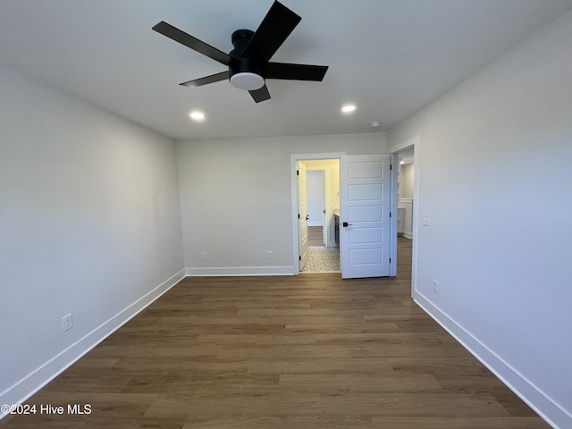 unfurnished bedroom featuring recessed lighting, ceiling fan, baseboards, and wood finished floors