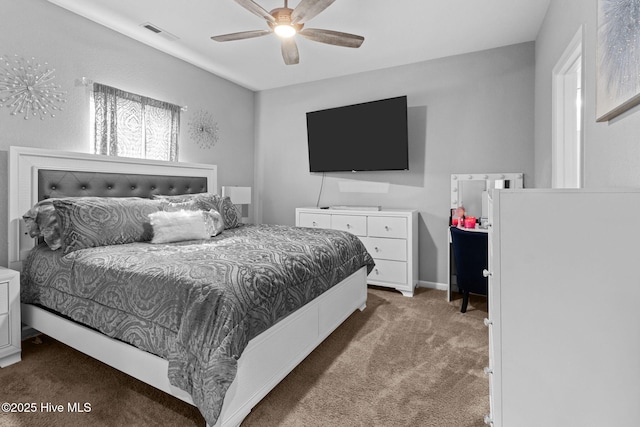 bedroom featuring a ceiling fan, carpet, visible vents, and baseboards