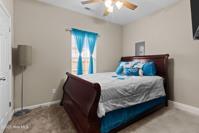 carpeted bedroom featuring visible vents, ceiling fan, and baseboards