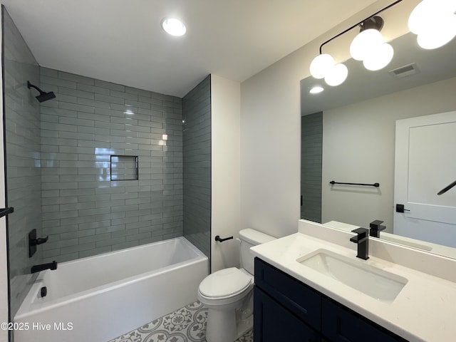 full bath featuring visible vents, toilet, vanity, shower / tub combination, and tile patterned flooring