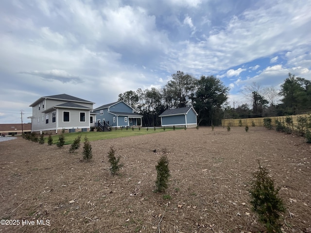 view of yard featuring fence