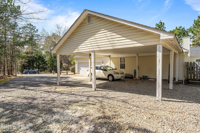 view of car parking featuring driveway