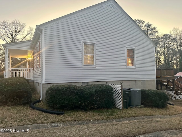 property exterior at dusk with central AC