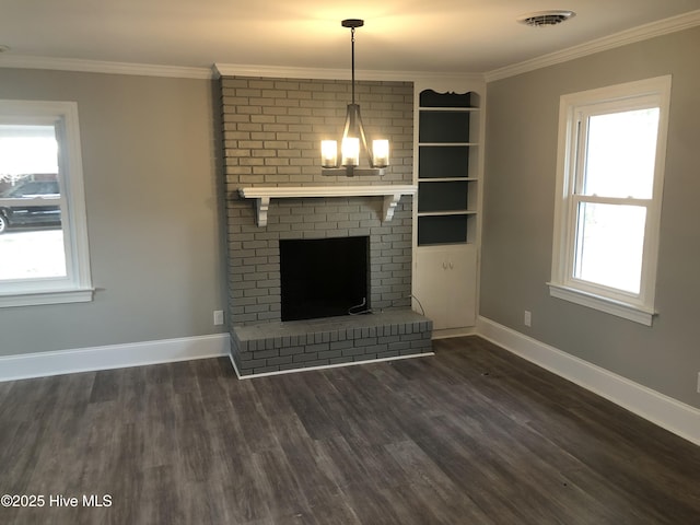 unfurnished living room featuring a fireplace, visible vents, dark wood finished floors, and ornamental molding