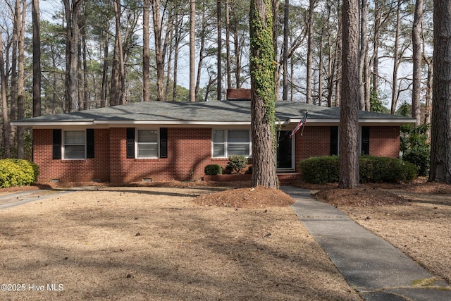 ranch-style home with brick siding and crawl space