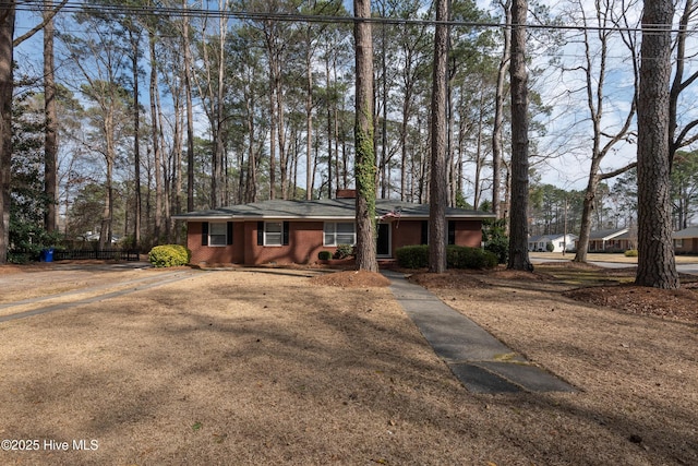 view of front facade featuring brick siding