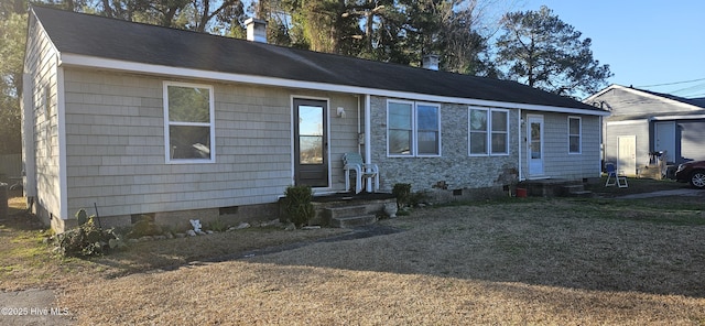 single story home featuring crawl space and a chimney