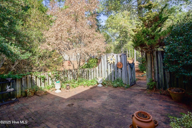 view of patio with fence