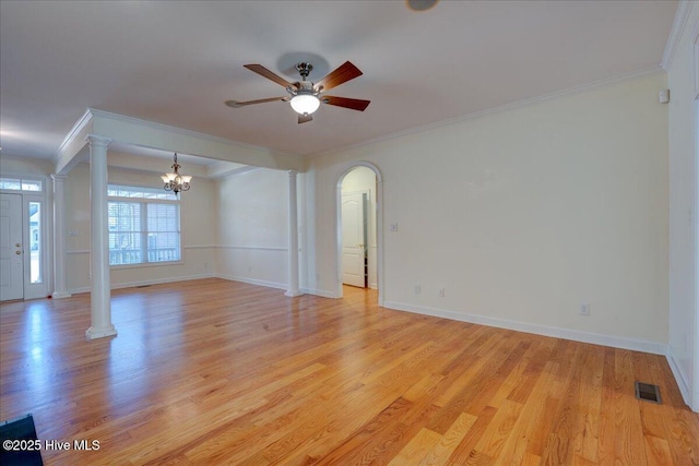 unfurnished room with ornamental molding, visible vents, light wood finished floors, and ornate columns