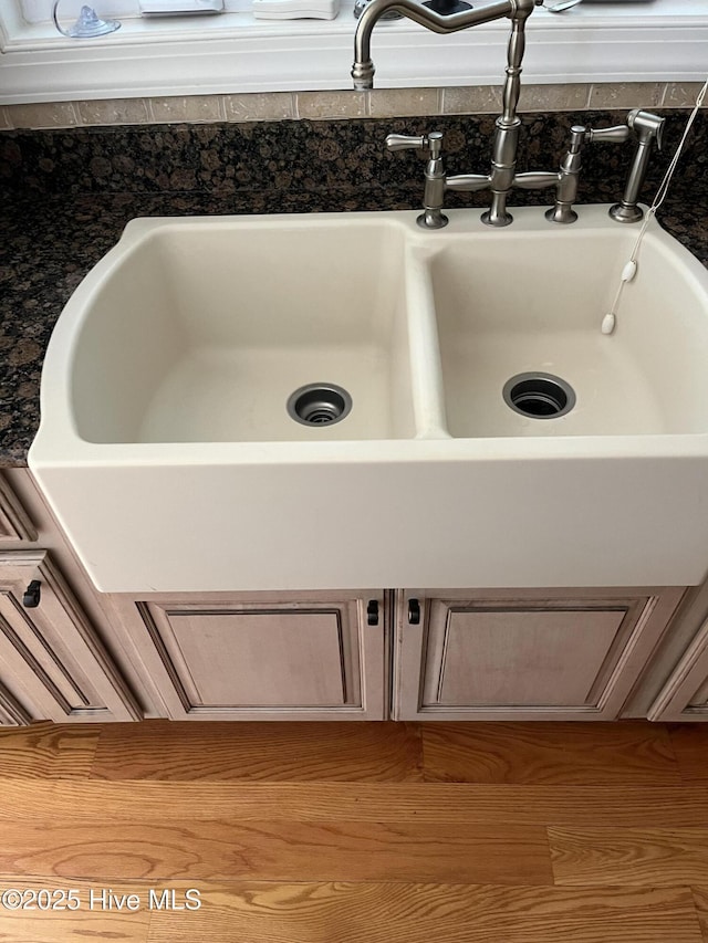 room details with a sink and dark countertops