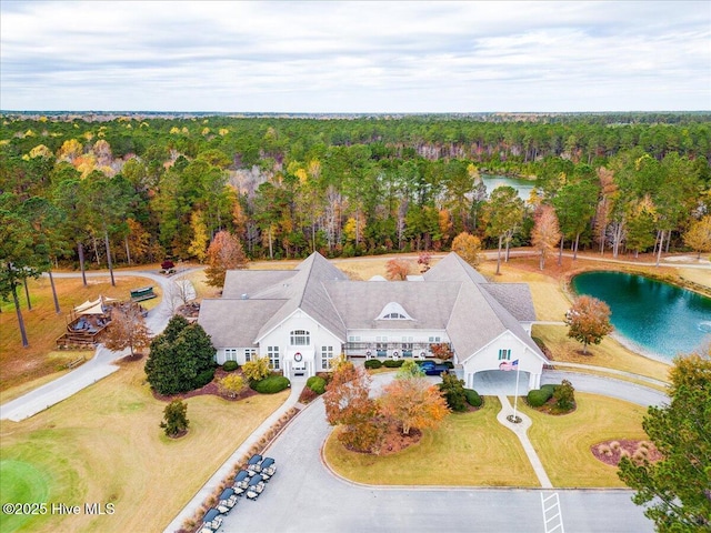 bird's eye view featuring a water view and a view of trees