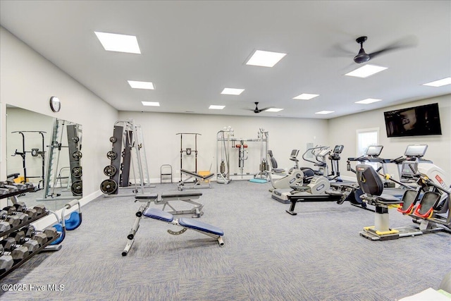 exercise room featuring carpet and ceiling fan