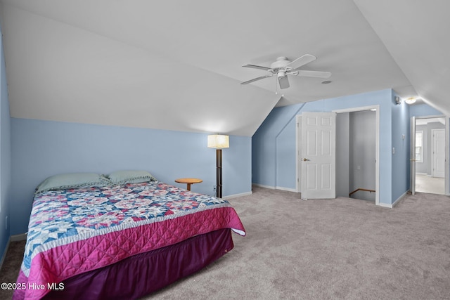 110 SE 7th St, Oak Island, NC 28465 - bedroom featuring vaulted ceiling, carpet flooring, a ceiling fan, and baseboards